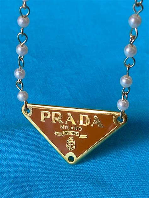 collana prada bianca|Collane Prada da donna .